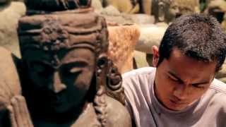Taufik: he paints stone statues in Bali.