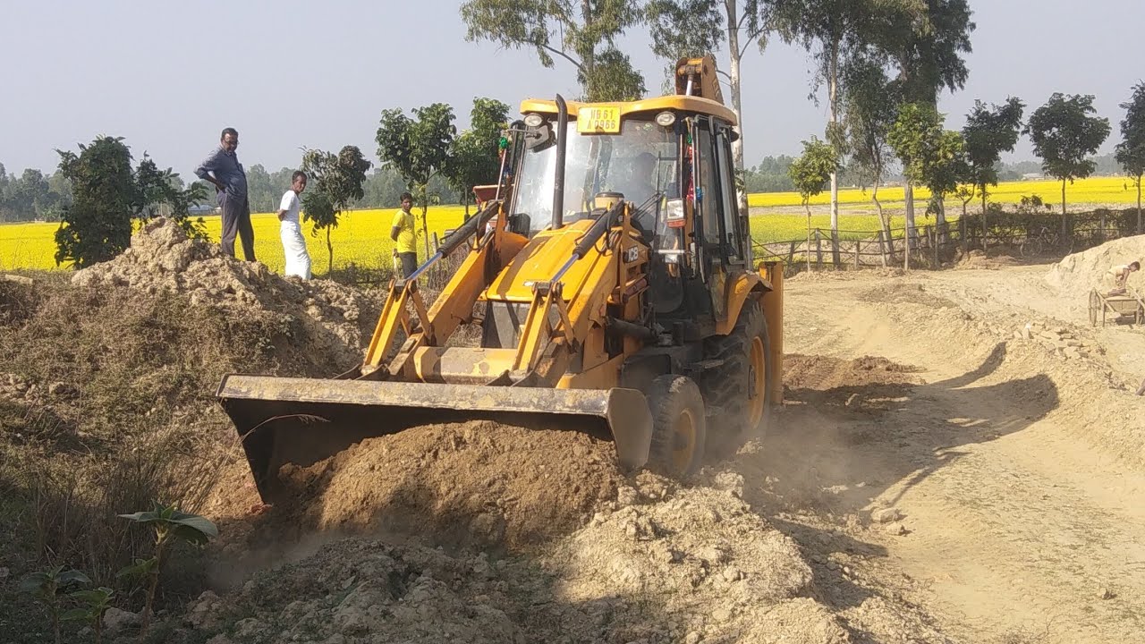 Leveling Mud On The field by Jcb 3dx dozer  Super Dozing Jcb 3dx Machine and Levelling Field 1