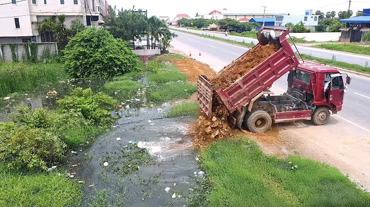 Started a new project using KOMATSU'U Dozer D21-A Pushing Soil into the water next to the highway