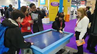 The Visilift+ being used as an interactive table
