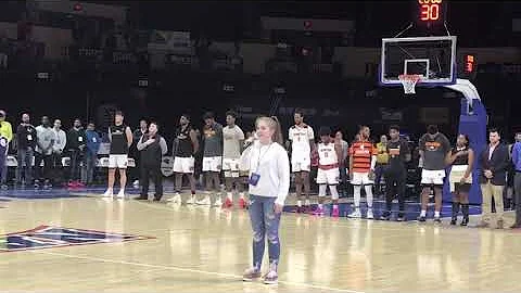 Janie Carr sings the National Anthem at the NAIA M...