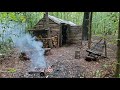 Bushcraft Log Cabin Camping in Rain Storm - Repairing and upgrading my survival shelter with my son