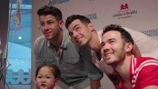 The Jonas Brothers Visit Patients In Seacrest Studios!