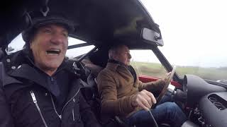 Nick Mason takes Brian Johnson for a ride in his Ferrari 250 GTO