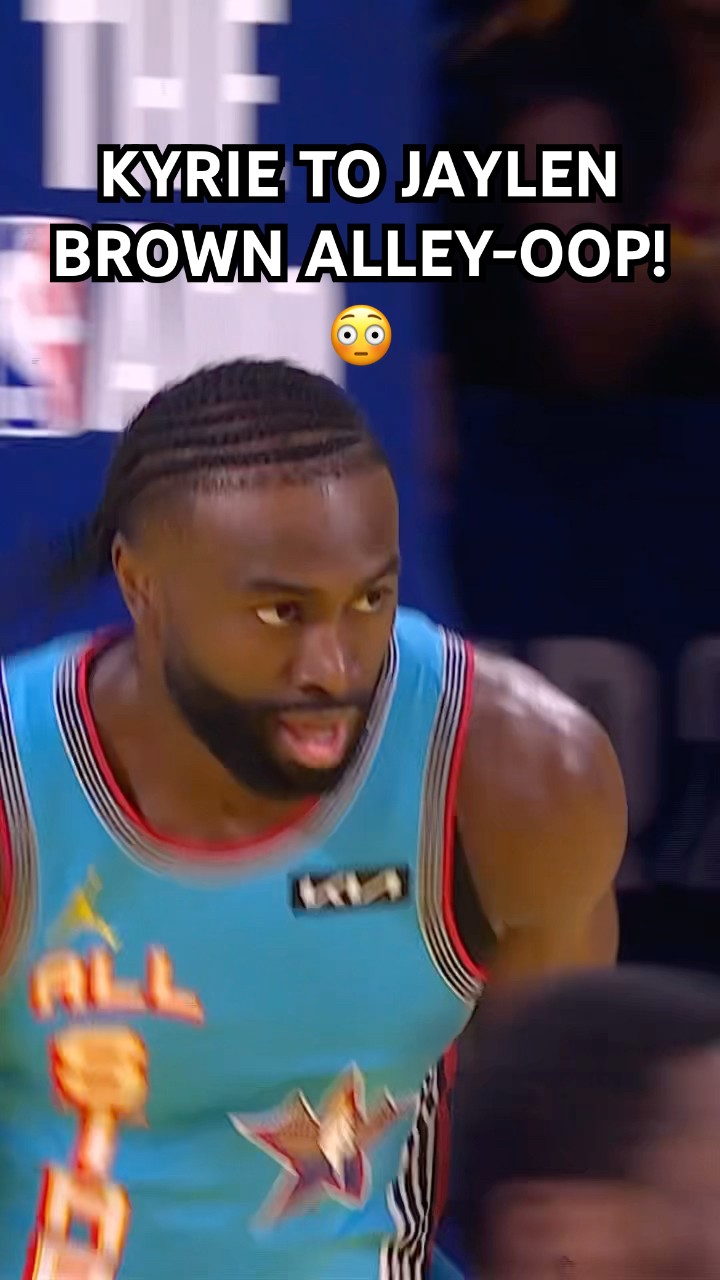 Jaylen Brown goes up top for the alley-oop