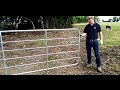 Farmer knowhow hanging a gate