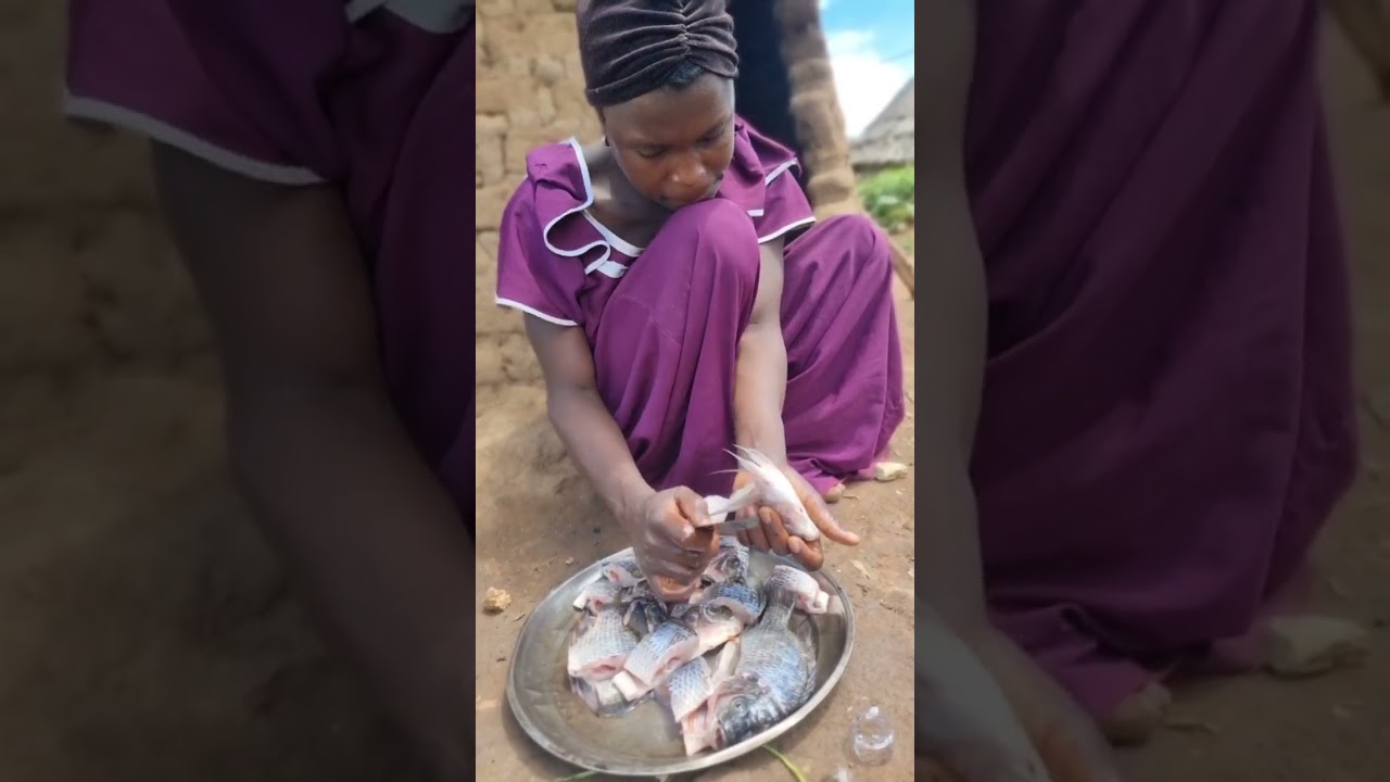 African Village life mom cooking for her children 