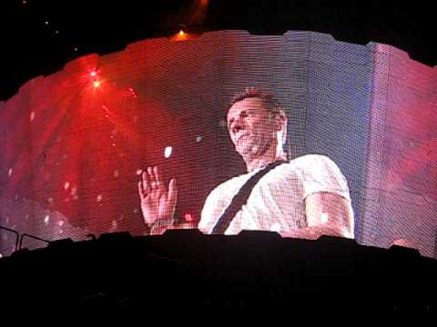 Larry Mullen jr. playing the bongo (djembe)