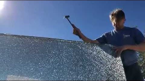 Slow motion breaking of tempered glass.