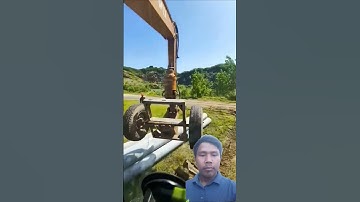 The process of excavators transporting utility poles- Good tools and machinery make work easy