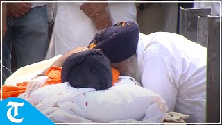 Sukhbir hugs father one last time before cremation at Lambi village