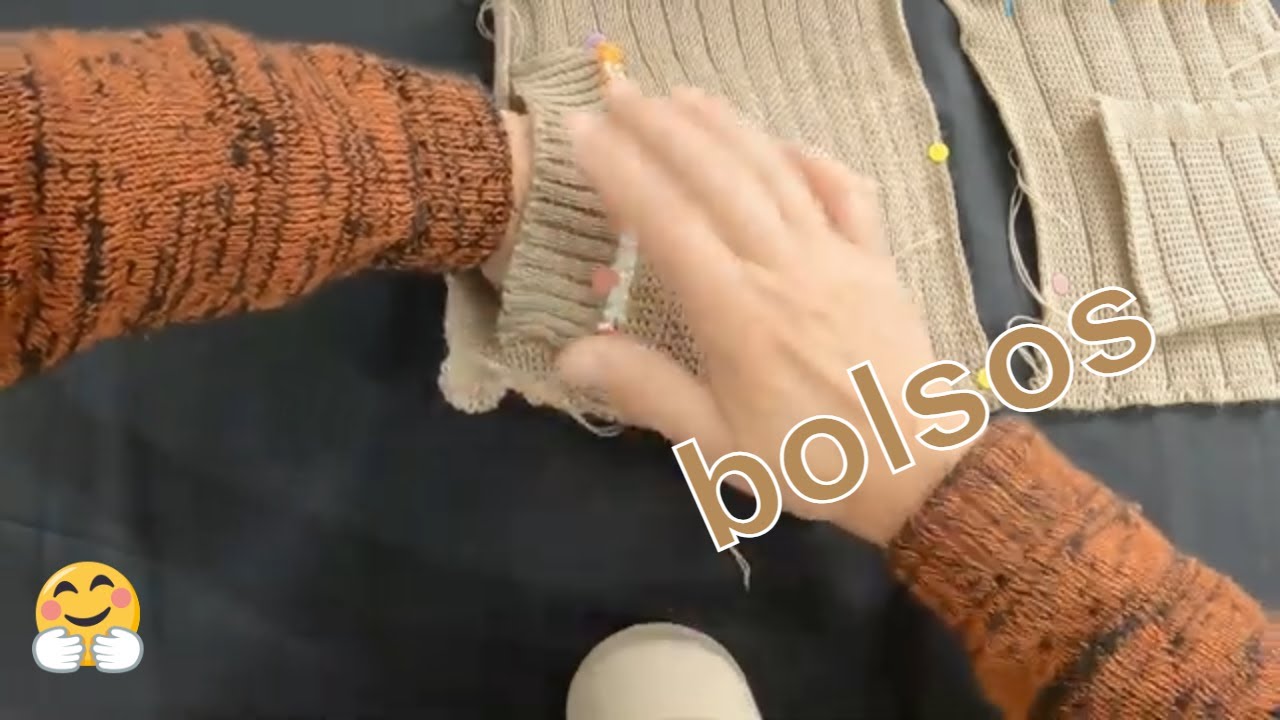 bolsos em casacos feitos em máquina de tricô