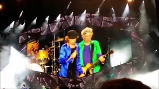 Keith Richards having fun with Mick Jagger as he hits wrong note on intro of Satisfaction