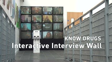 Interactive vintage video wall of CRT TVs