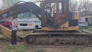 Husband Unloading his project Cat 314c LCR