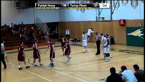 Connor Milmoe with a basket despite being fouled a...