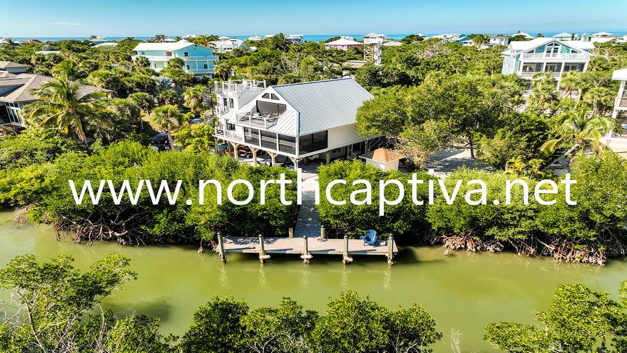 Воплотите мечту об острове в жизнь в этом отреставрированном прибрежном доме | 341 Spanish Gold Ln