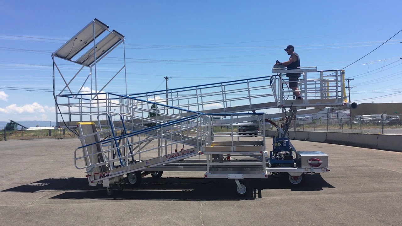 The latest KCI hydraulic-electric boarding ramp - YouTube