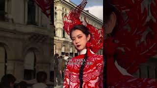 Women Clad In Papercutting Gowns Stroll Through Streets Of Milan