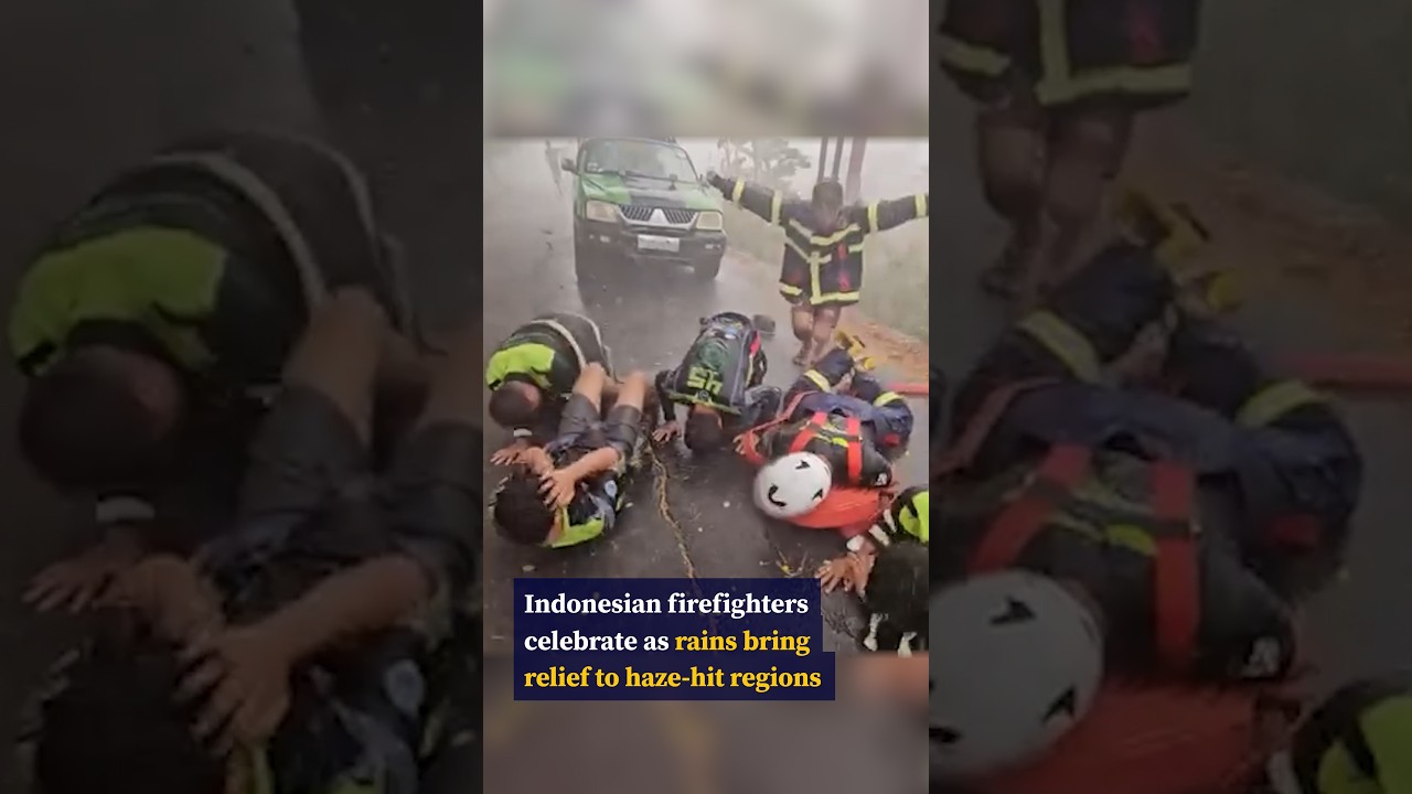 Indonesian firefighters celebrate as first rains bring relief to haze-hit regions