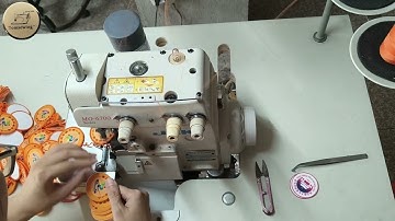 JUKI MO 6700 Emblem edging overlock stitch machine Secondhand industrial sewing machines Tomsewing