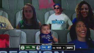 A Beautiful Baby in the Dallas Mavericks crowd (f. Jeff Van Gundy)