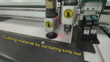 Cardboard cutting by oscillating knife and creasing wheel