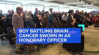 Boy battling brain cancer sworn in as honorary officer