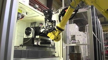 Automation Solutions: Fanuc R2000 iB robot is mounted to an RTU to service 3 VMC