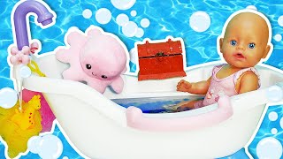 Baby doll bath time \& evening routine. Toy tube for baby born doll \& baby shark toys.