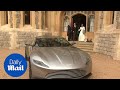 Princess Beatrice helps Princess Eugenie into Aston Martin