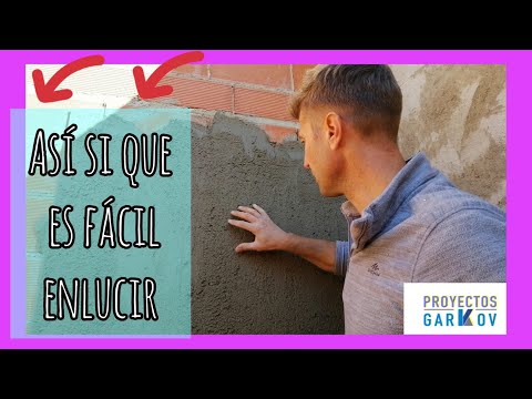 Video: Revoque de fachada de cemento para nivelación de superficies