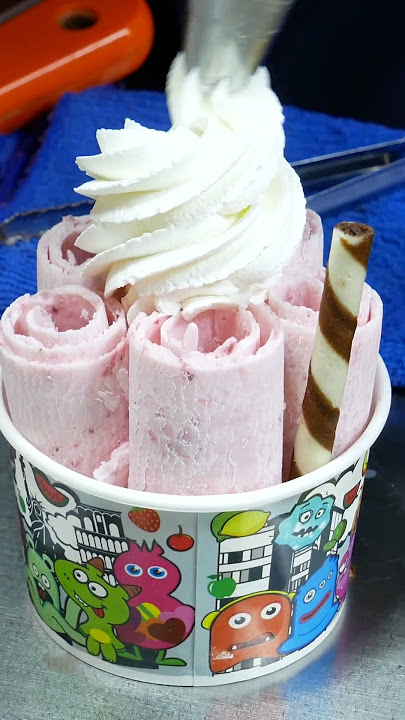 Making rolled ice cream, a Thai street food 