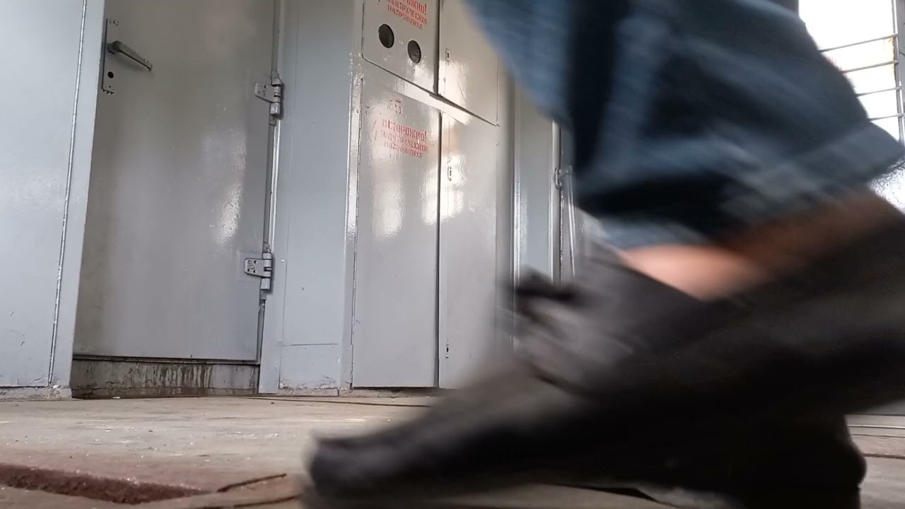 Barefoot male shoeplay in train