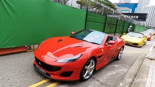 I film a large convoy of around 50 ferraris from the ferrari owners'
club singapore parading in to marina square watch formula 1 grand prix
...