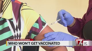 Why are some choosing not to get the COVID-19 vaccine?