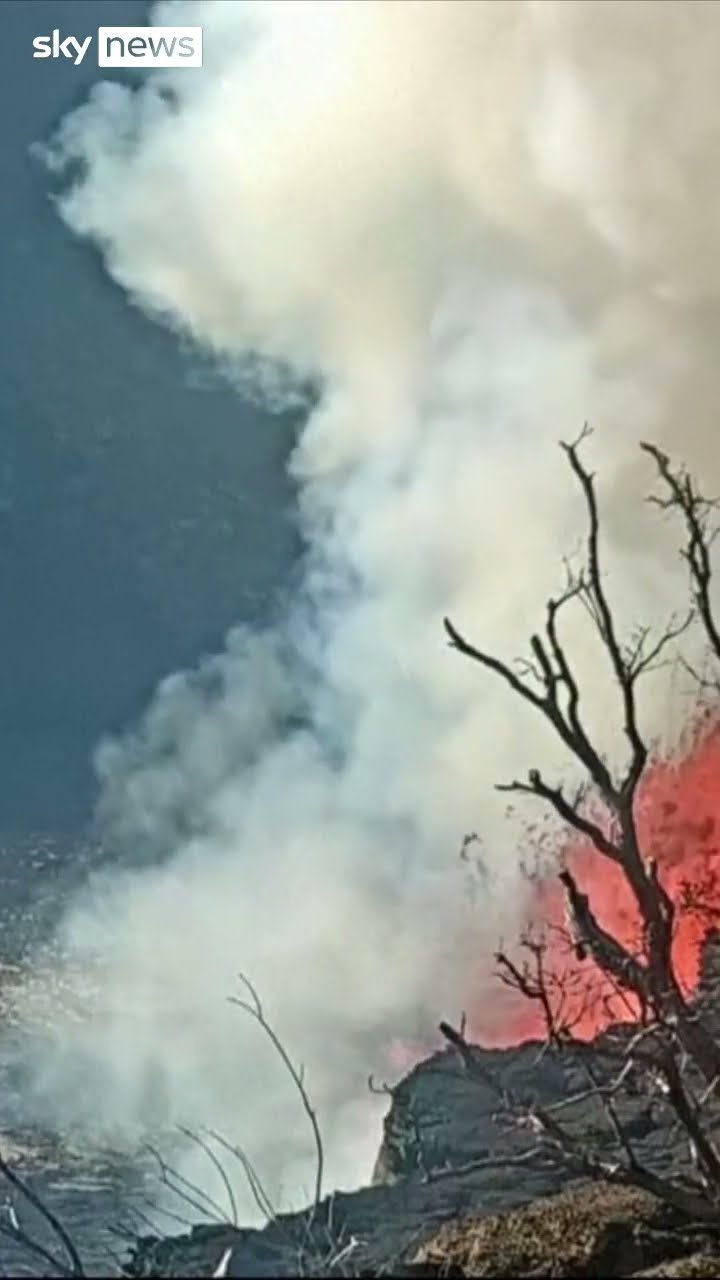 Lava bubbles as volcano erupts in Hawaii