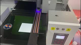 A3 3060 UV printer printing on the leather belt