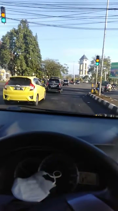 Story' wa 30 detik nyetir mobil di sore hari