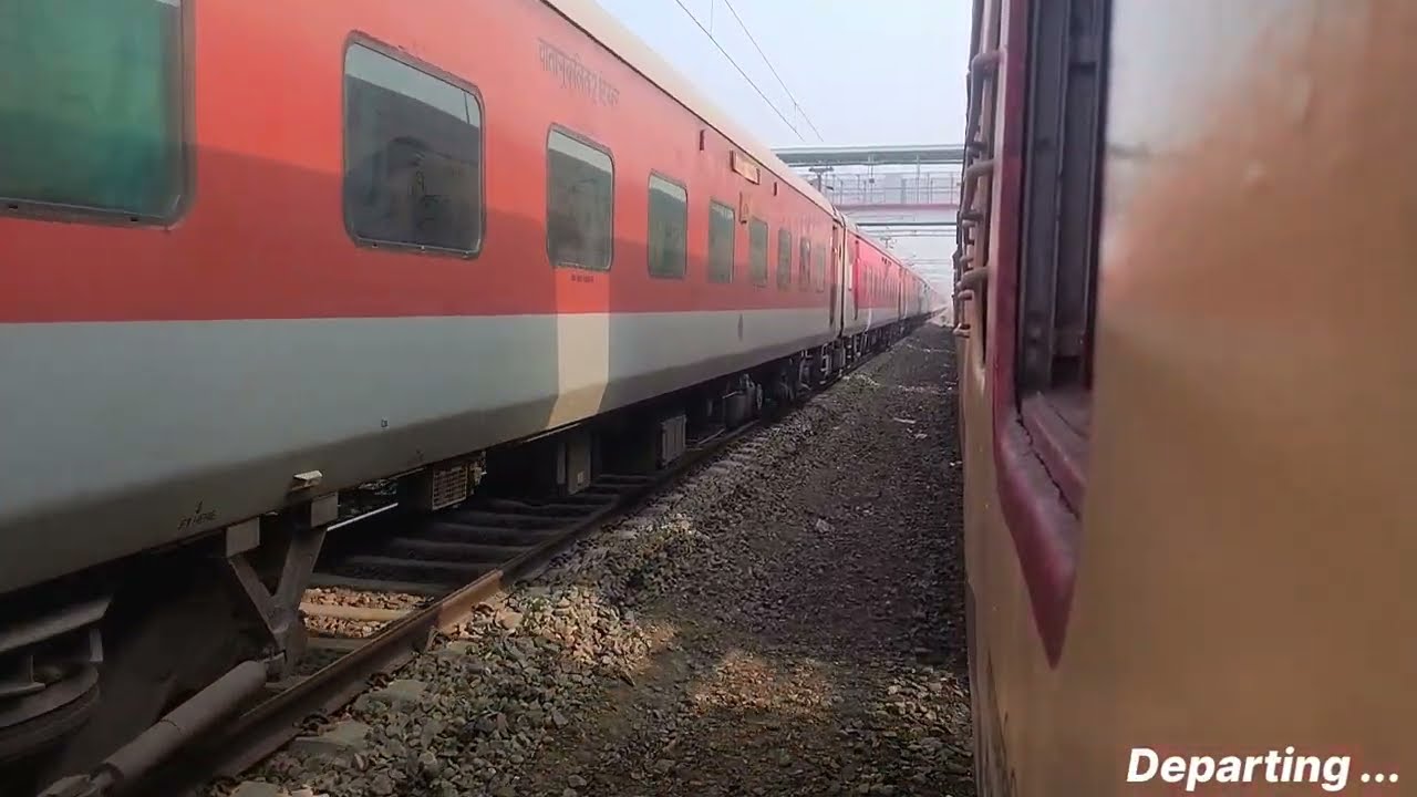 55909 Dibrugarh passenger entering and departing Moranhat with Dibrugarh Deoghar exp coaches halted.