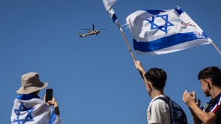 Crowd at Hostages Square watch as freed captives airlifted to nearby hospitals