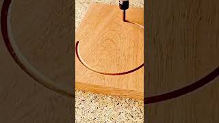 cutting a precise circular groove on a wooden board using a high speed electric cnc router machine