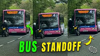 Stand Off Between Bus and Motorbike