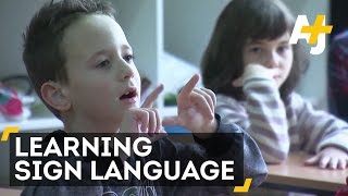 Students Learn Sign Language To Help Out Their Classmate