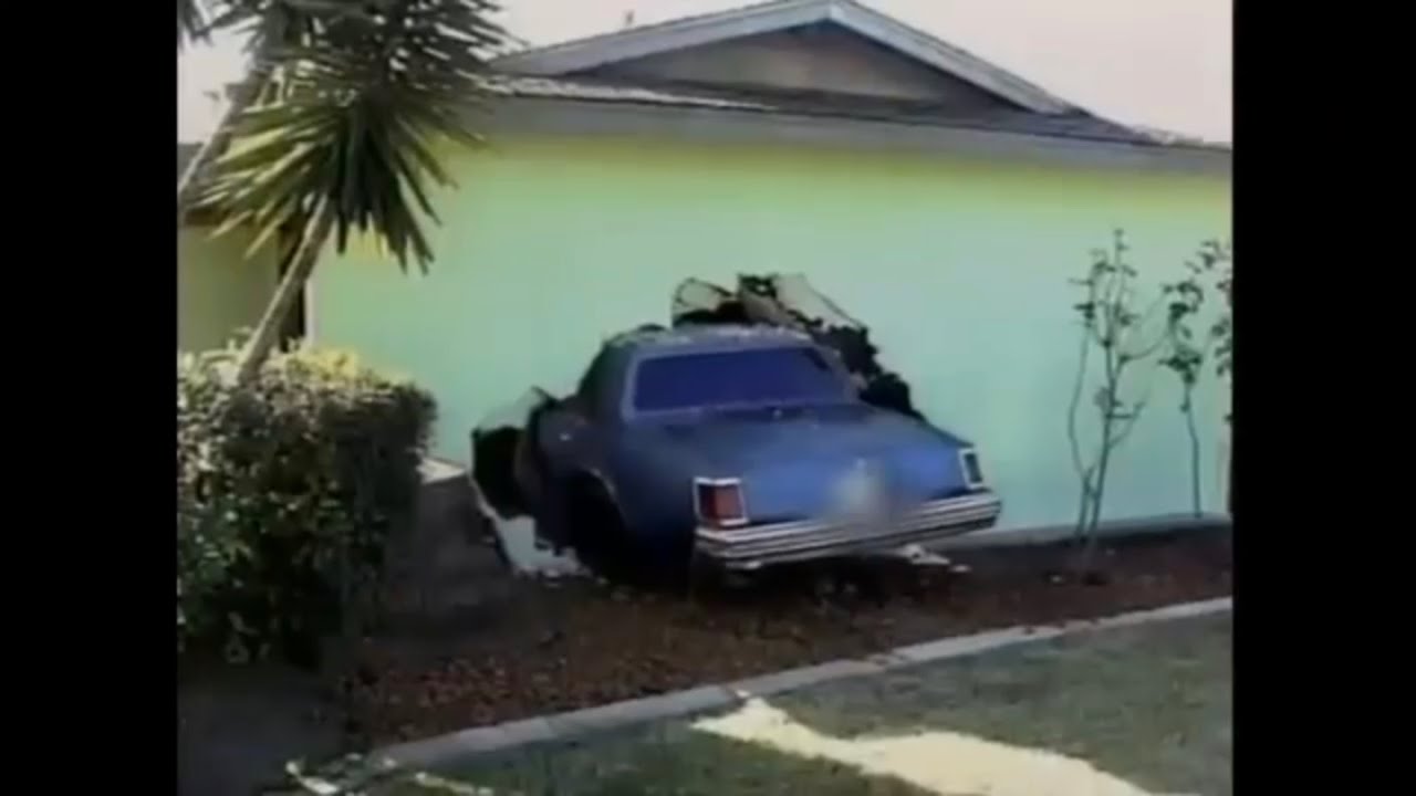 Woman Crashes Car Into House - YouTube