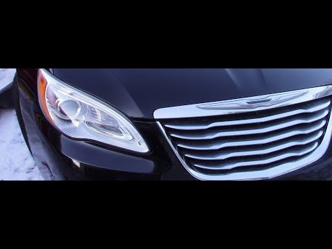 How to change head light bulb on a Chrysler 200