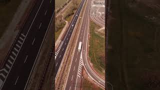 Aerial View of SUV Driving on Snowy Road  Winter Adventure Journey #WinterDrive #SnowyRoad #shorts