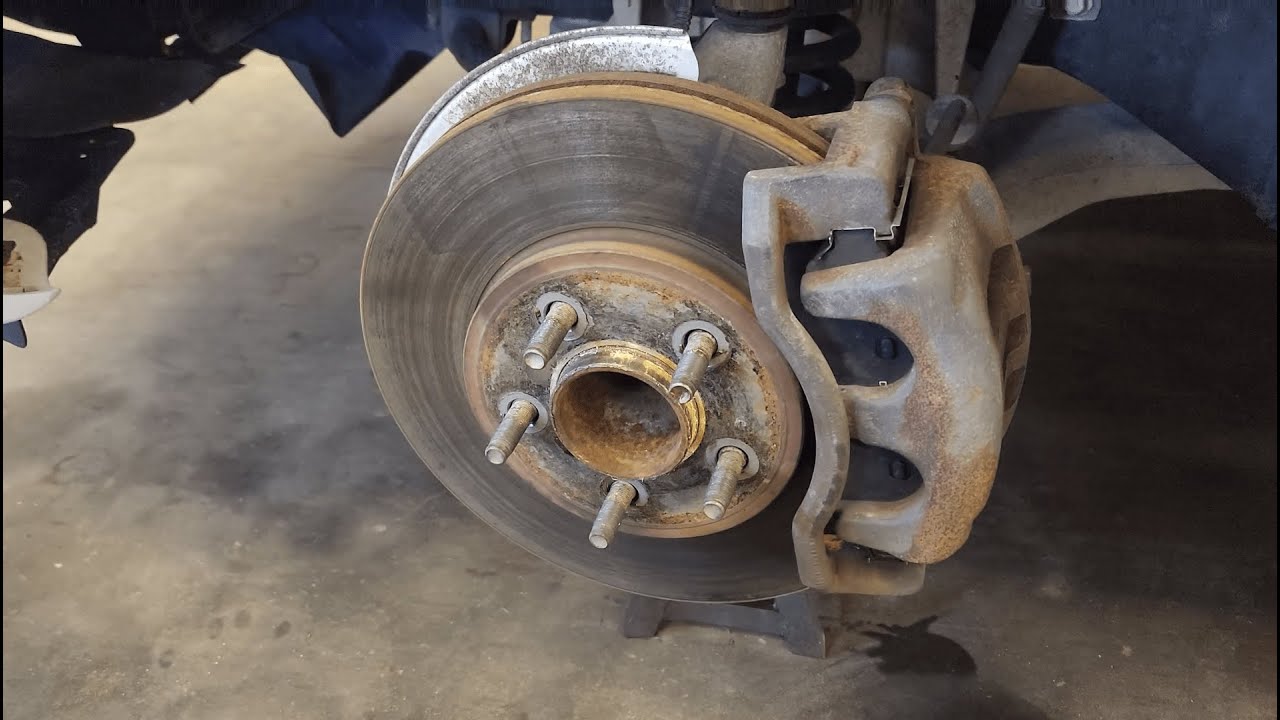 How to change brakes on a 20032011 Lincoln Town Car YouTube