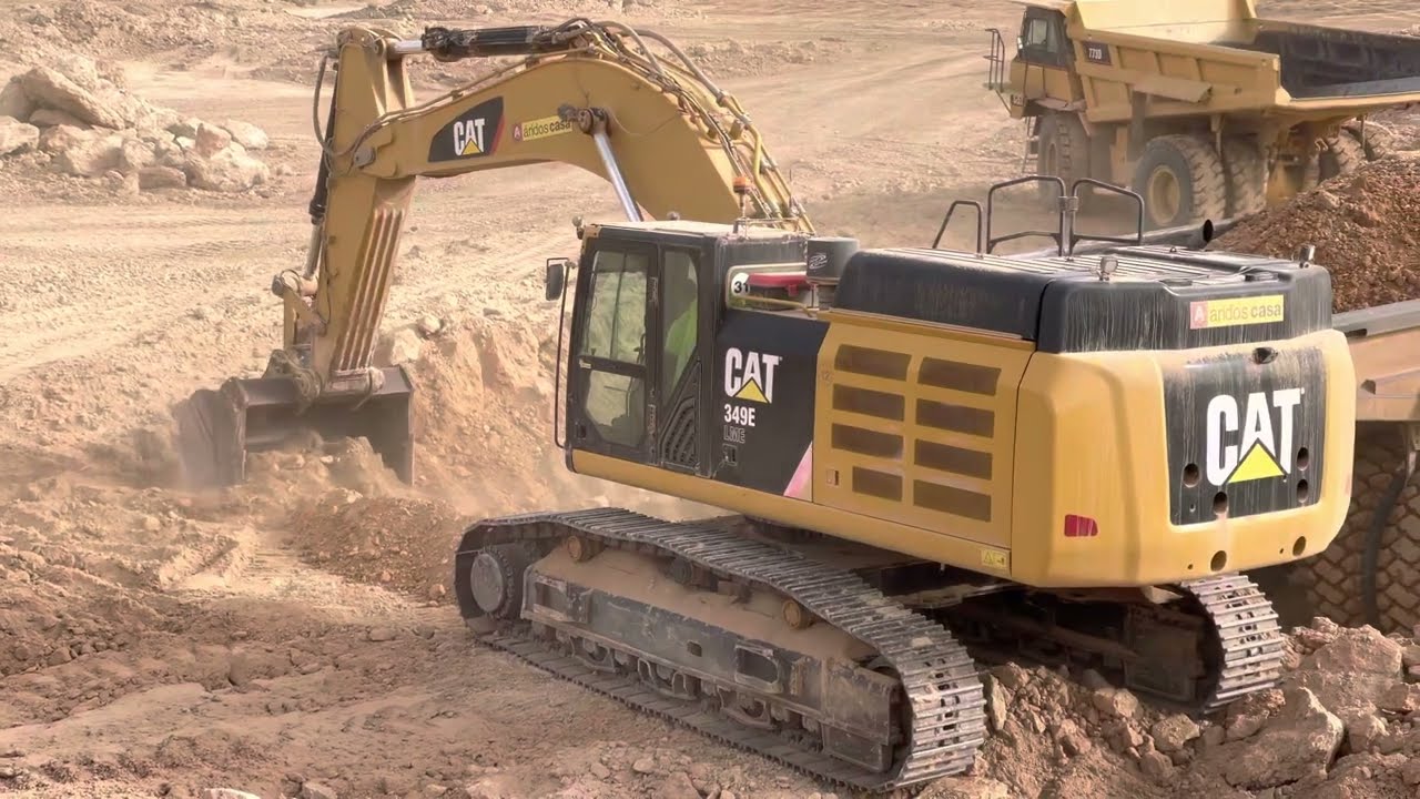CAT 349E LME | Excavator and Dump Truck Working Together | Machines at Work