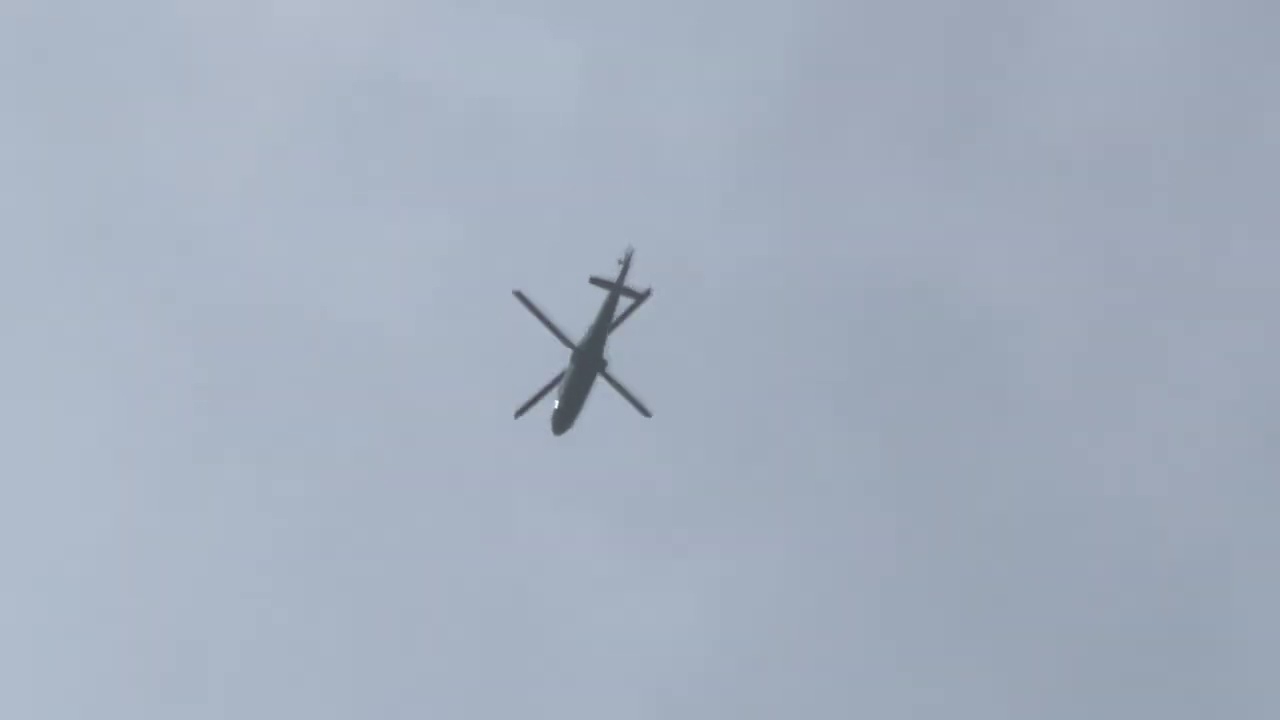 Private Agusta AW109 [G-SKBL] flying overhead